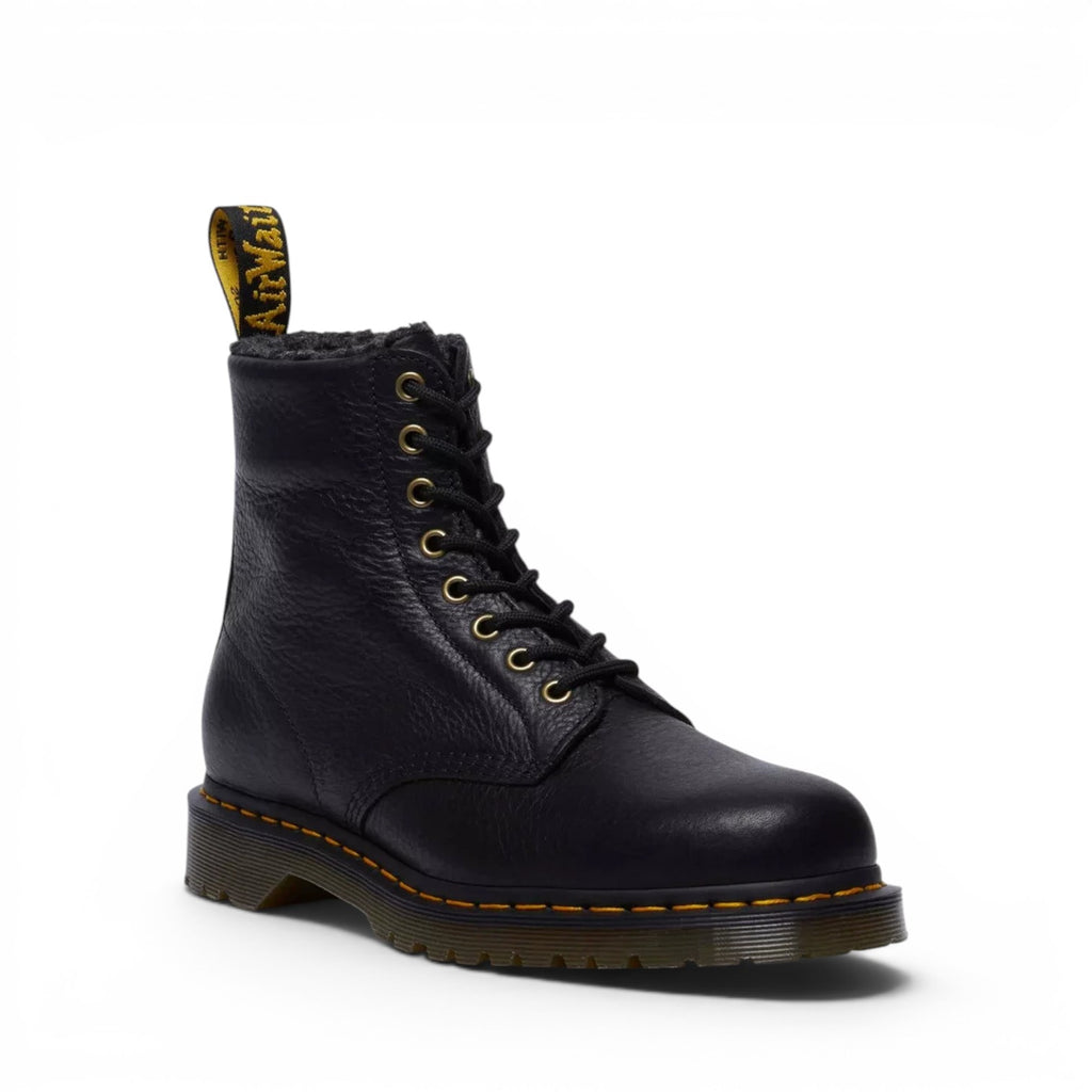 ShoeShop Dr. Martens 1460 black grizzly leather boots with warm faux fur lining and signature yellow welt stitching.