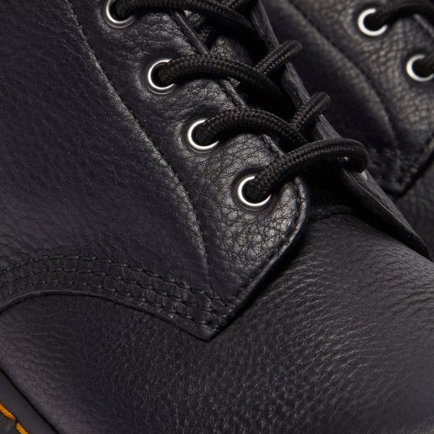 ShoeShop Dr. Martens 101 Ambassador black tumbled leather ankle boots with silver eyelets and yellow welt stitching