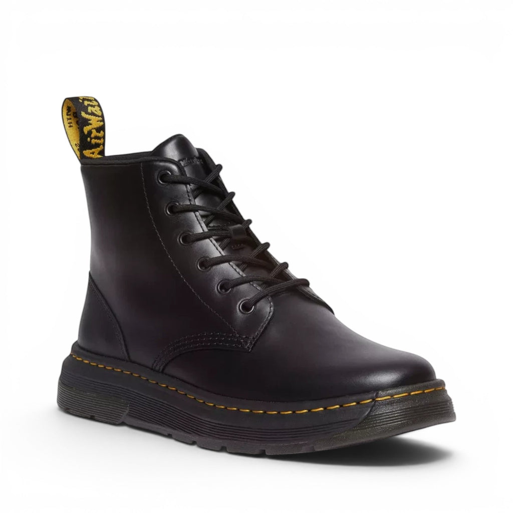 ShoeShop Dr. Martens black leather lace-up ankle boots with signature yellow stitching and heel loop