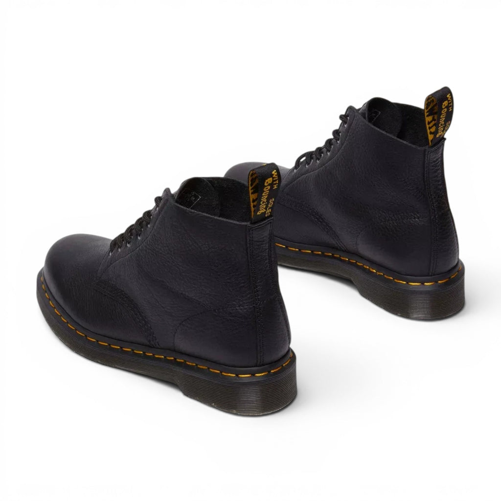 ShoeShop Dr. Martens 101 Ambassador black leather ankle boots with yellow stitching and heel loops