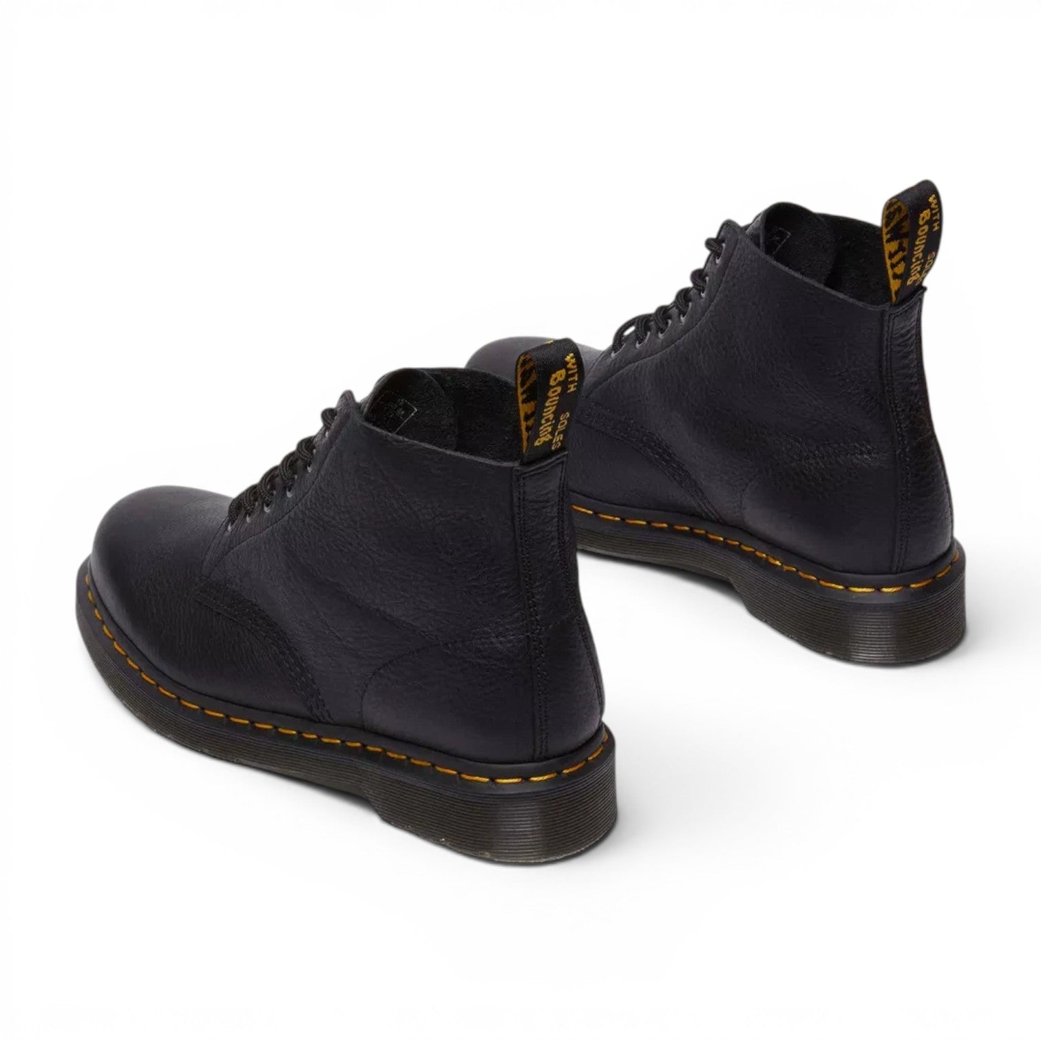 ShoeShop Dr. Martens 101 Ambassador black leather ankle boots with yellow stitching and heel loops