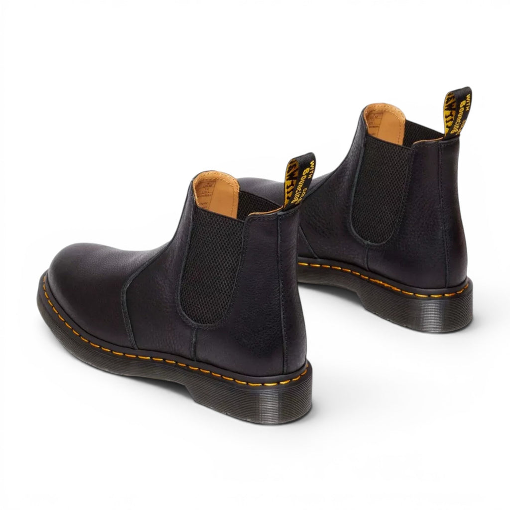 ShoeShop Dr. Martens 2976 black ambassador leather Chelsea boots with signature yellow stitching and pull tabs