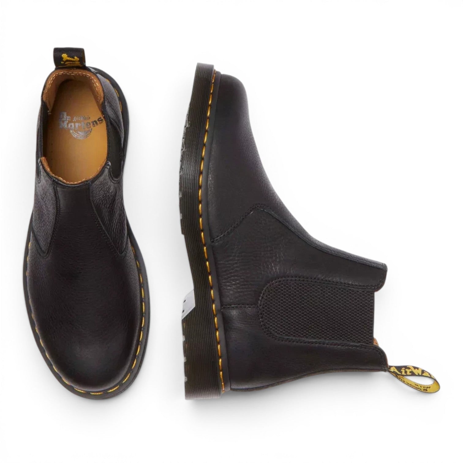 ShoeShop Dr. Martens 2976 Ambassador black leather Chelsea boots with signature yellow stitching and pull tabs.