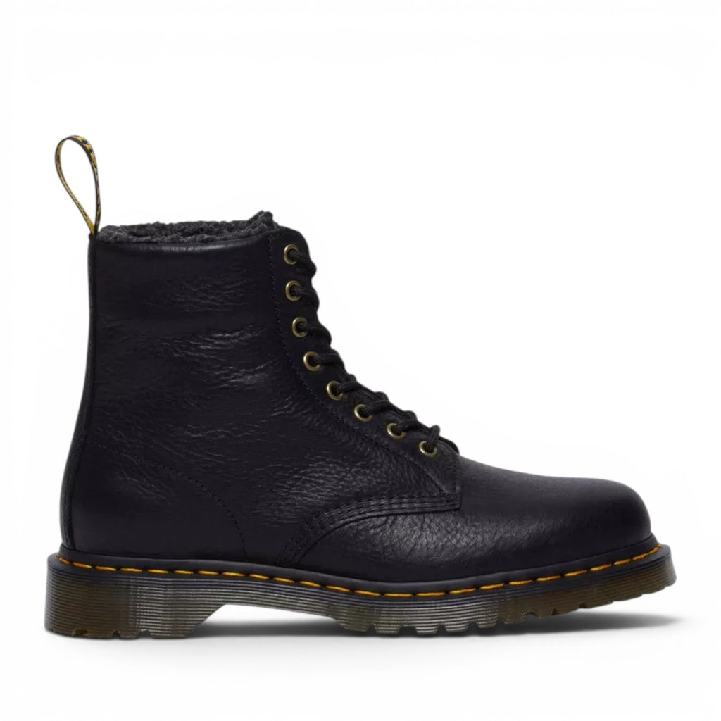 ShoeShop Dr. Martens 1460 black grizzly leather boots with faux fur lining and signature yellow stitching.