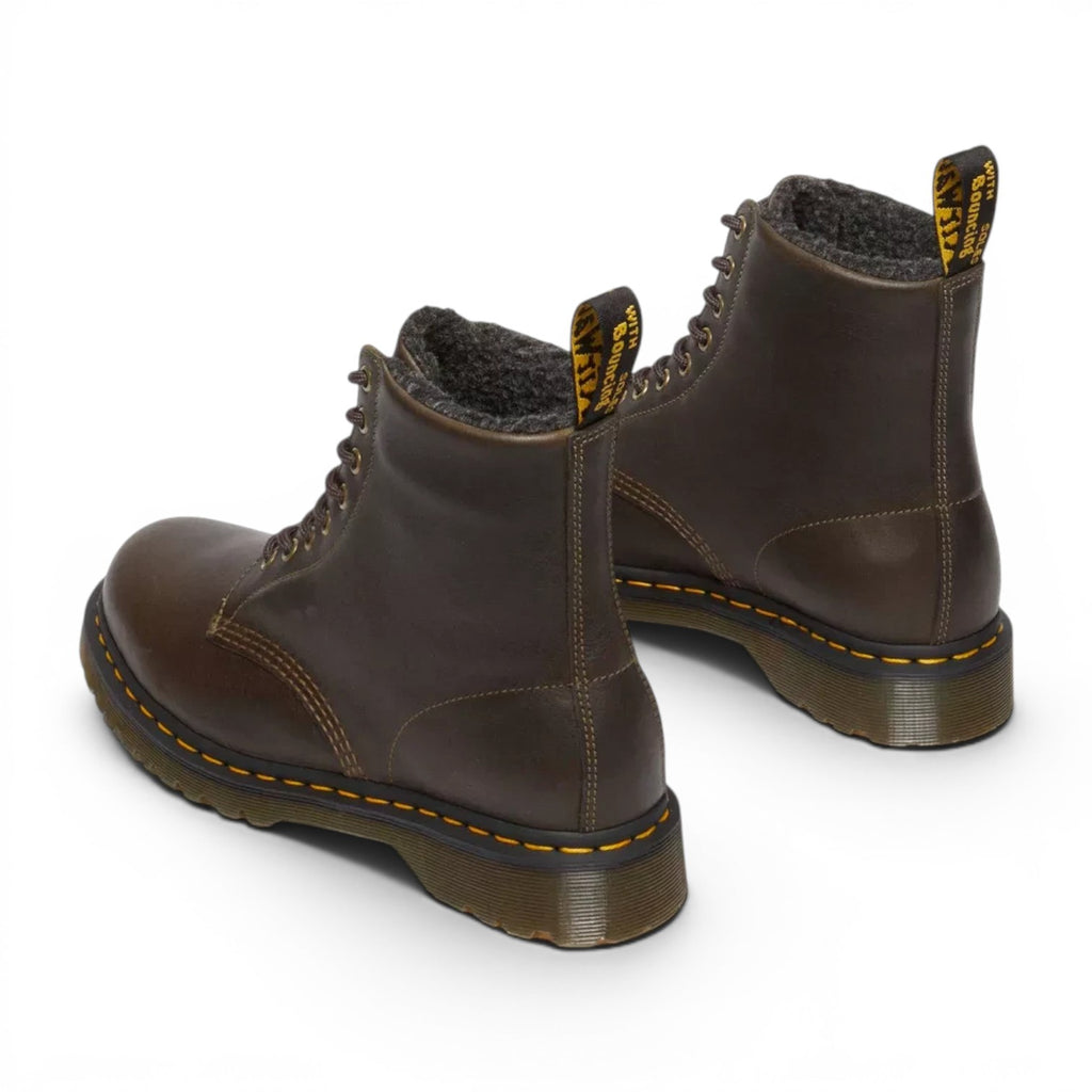 ShoeShop Dr. Martens 1460 brown grizzly leather boots with warm faux fur lining and signature yellow stitching.