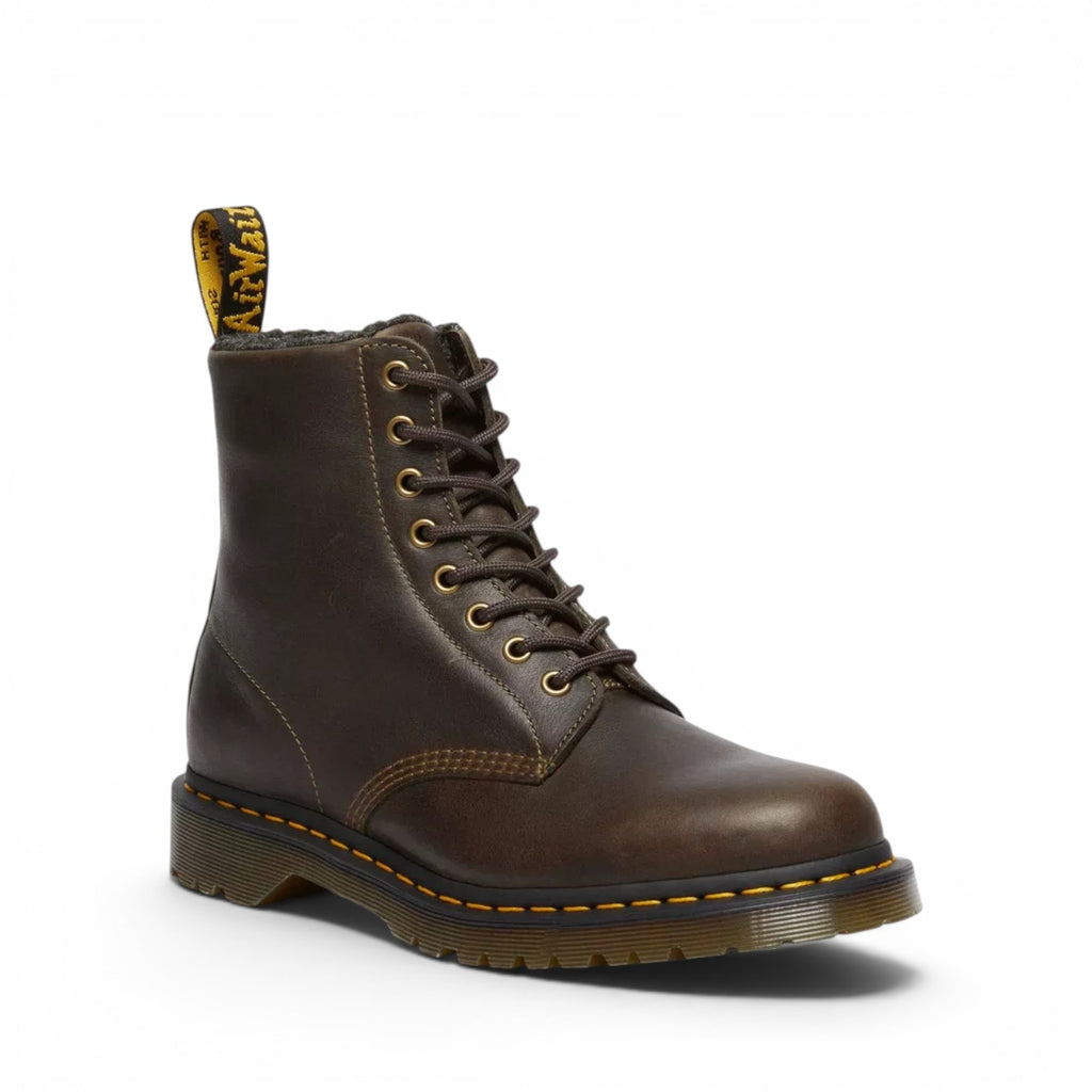 ShoeShop Dr. Martens 1460 brown grizzly leather boots with faux fur lining and signature yellow welt stitching.
