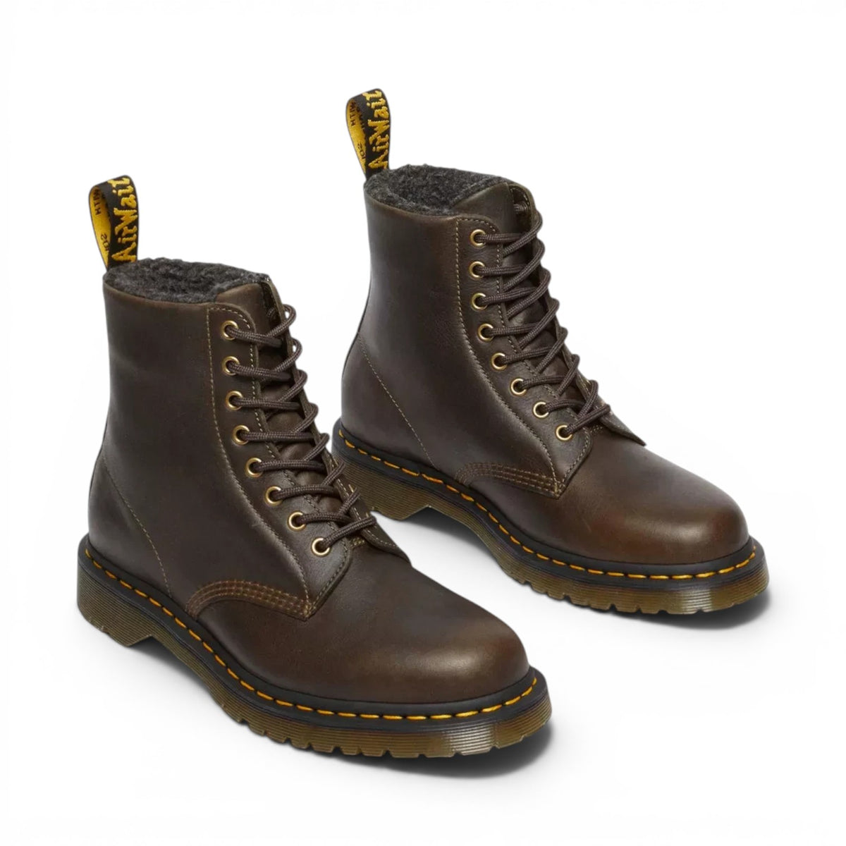 ShoeShop Dr. Martens 1460 boots in brown grizzly leather with warm faux fur lining and signature yellow stitching.