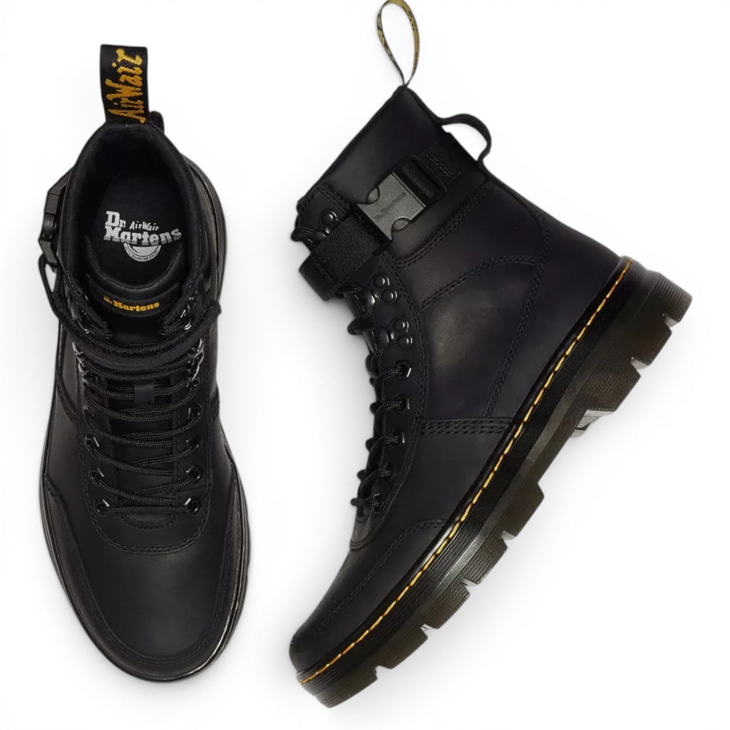 ShoeShop Dr. Martens Combs Tech II black Wyoming leather utility boots with buckle strap and yellow welt stitching