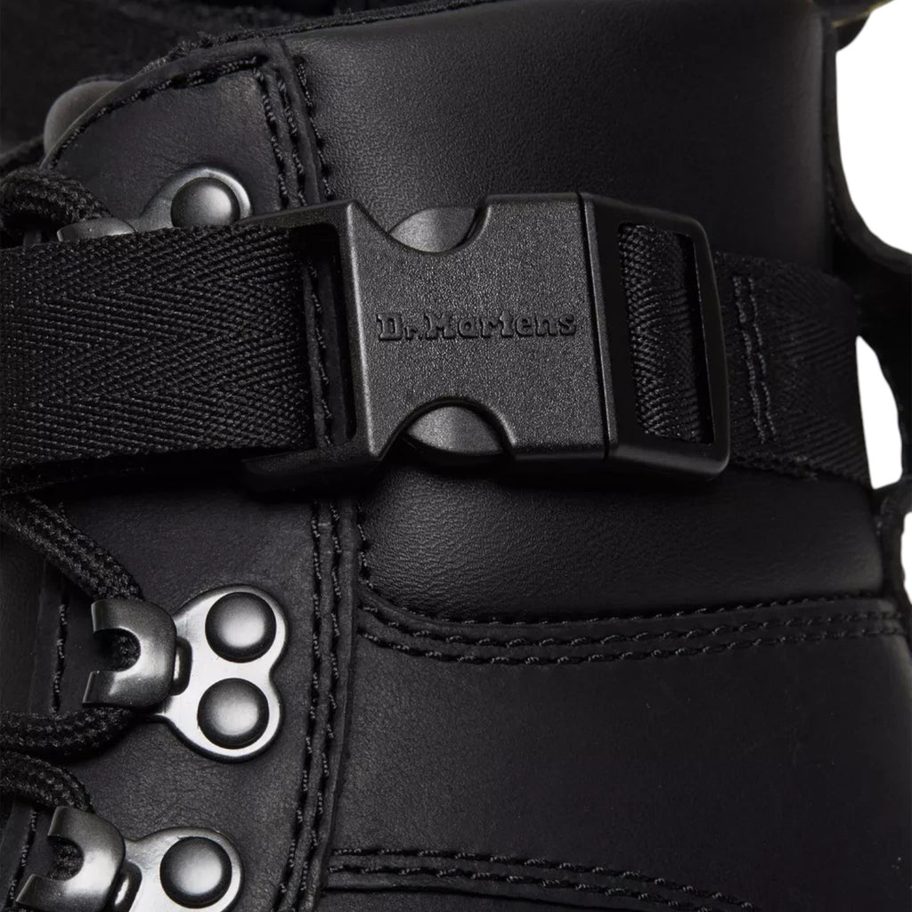 ShoeShop Dr. Martens Combs Tech II black Wyoming leather utility boot with buckle strap and metal eyelets