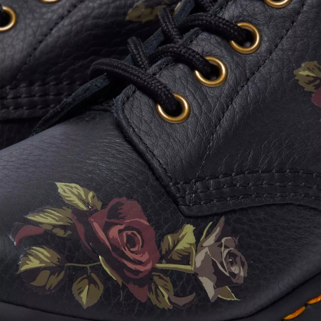 ShoeShop Dr. Martens 1460 Decayed Roses black leather boots with floral print, gold eyelets, and textured finish