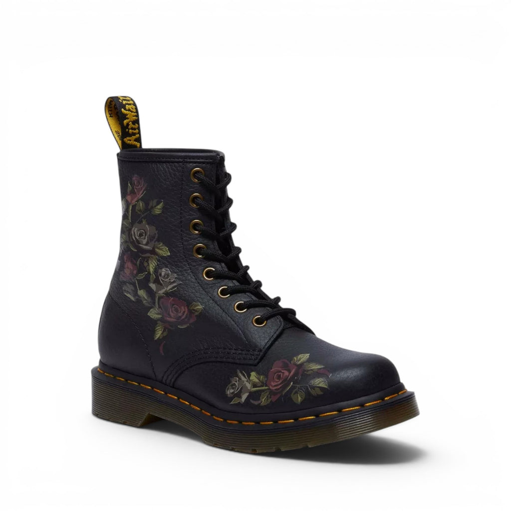 ShoeShop Dr. Martens 1460 black leather boots with a decayed rose floral print, gold eyelets, and yellow stitching.