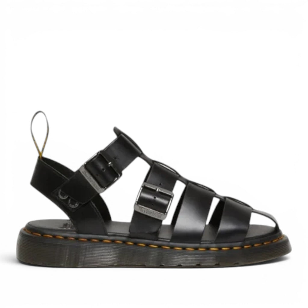 ShoeShop Dr. Martens Garin Brando black leather gladiator sandals with adjustable buckle straps and signature yellow stitching.