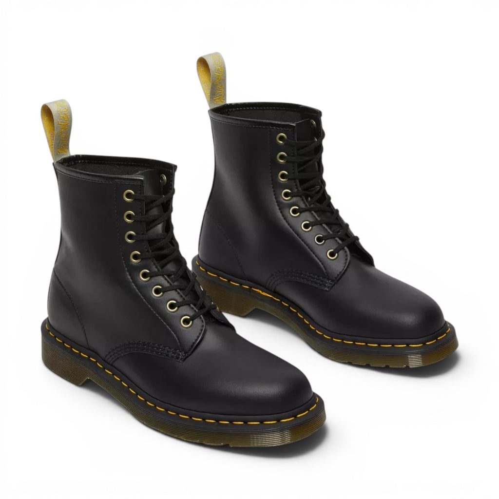 ShoeShop Dr. Martens Vegan 1460 Felix black lace-up boots with yellow stitching and signature heel loop