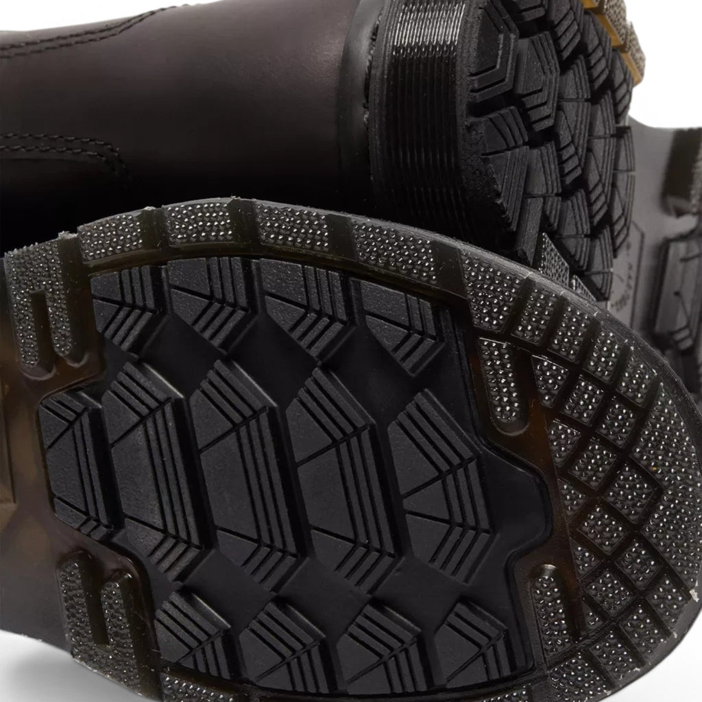 ShoeShop Dr. Martens 2976 Alyson Chelsea boots featuring a black Wintergrip PVC lugged sole for superior traction.