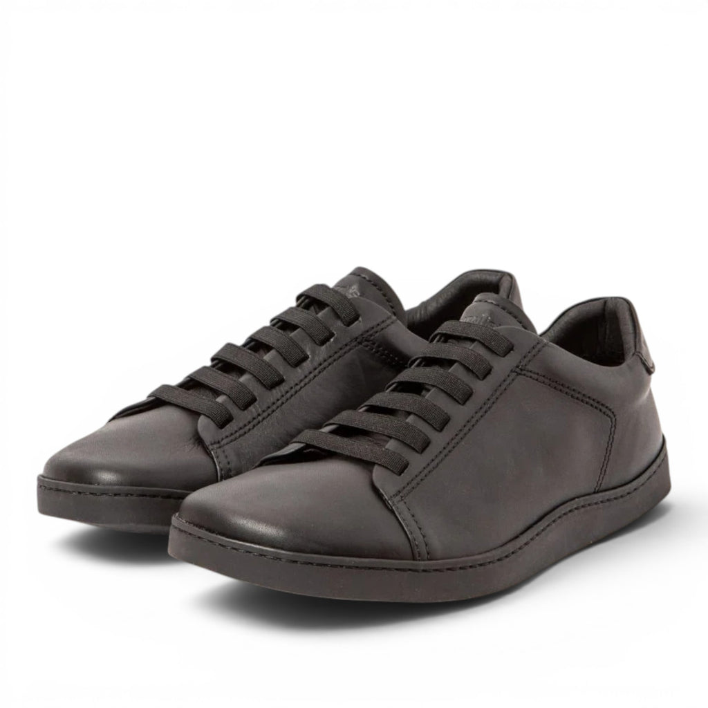 ShoeShop El Naturalista 5910 black leather sneakers with a minimalist low-top design and matching black laces.