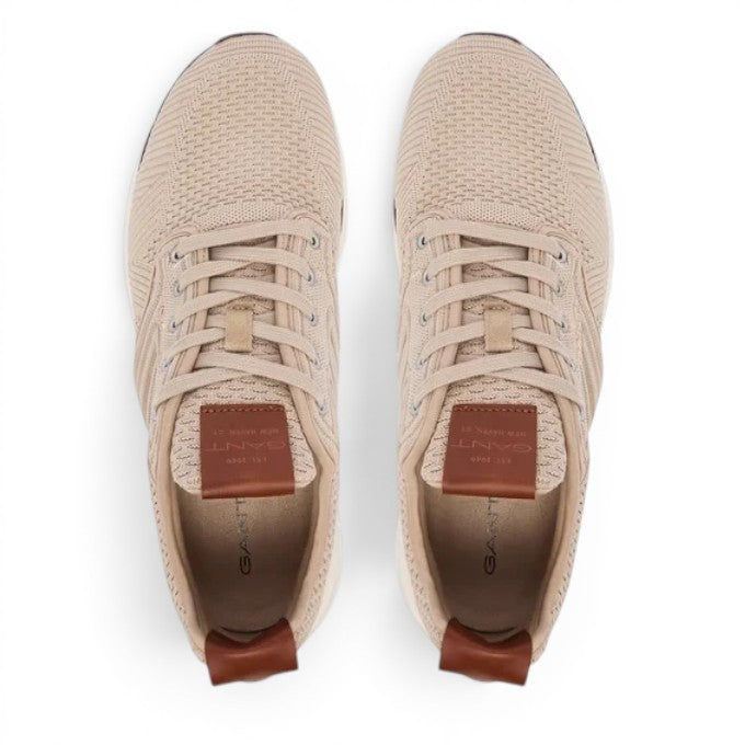 ShoeShop GANT beige knit sneakers with brown leather heel tab and tongue patch, top-down view.