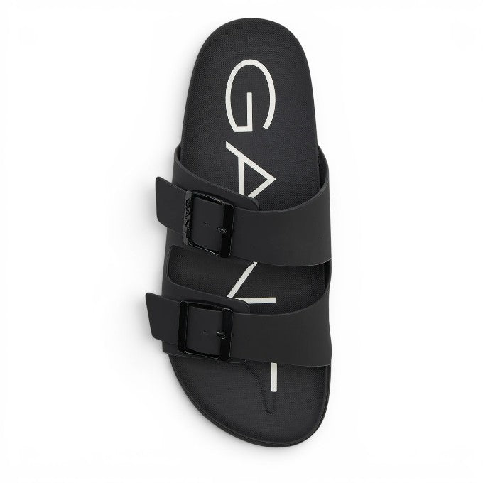 ShoeShop GANT black double-strap slide sandals with adjustable buckles and white logo branding on the footbed