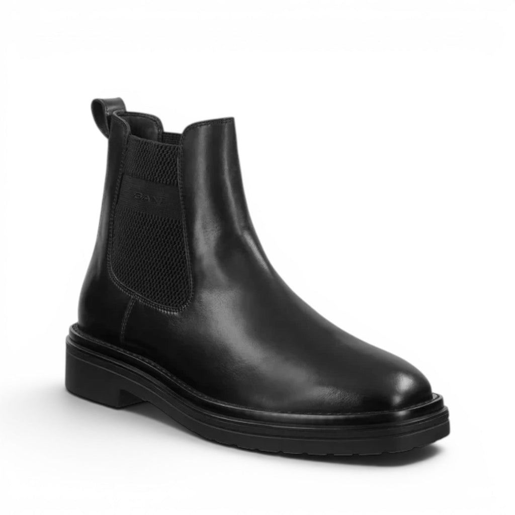 ShoeShop GANT black leather Chelsea boots with elastic side panels and a durable rubber lug sole.