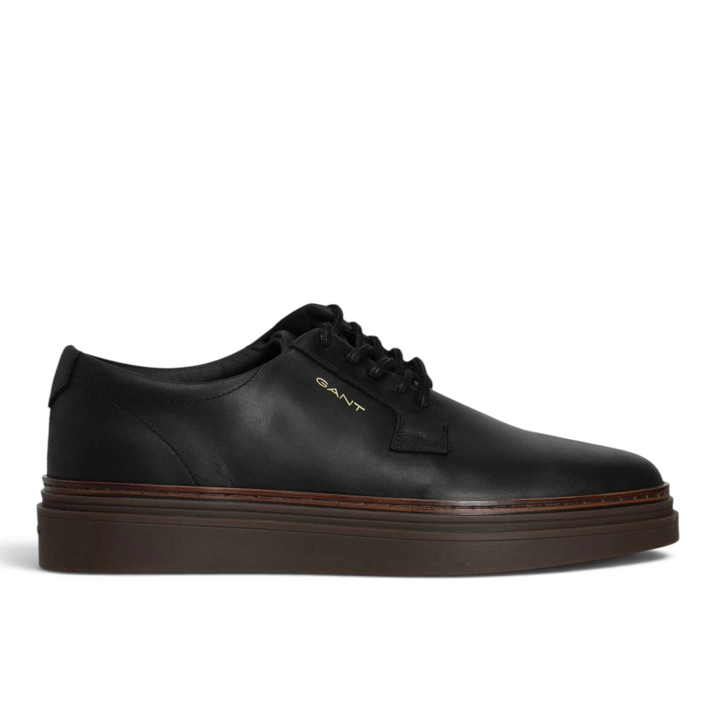 ShoeShop GANT black leather lace-up sneakers with a thick brown rubber sole and gold logo detail