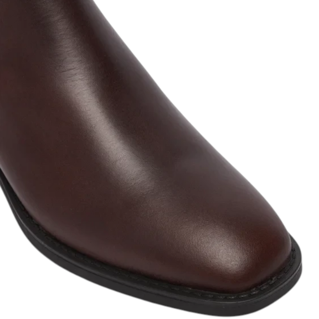 Close-up of a dark brown leather GANT boot toe with a smooth finish and black sole from ShoeShop