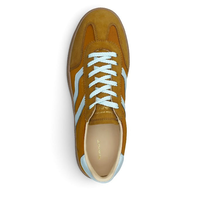 ShoeShop GANT mustard suede sneakers with light blue accents and white laces, top-down view.