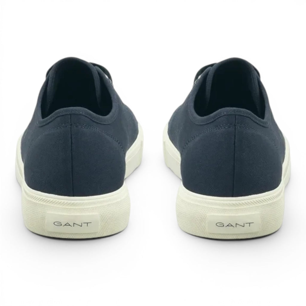Rear view of navy blue canvas GANT sneakers with white rubber soles from ShoeShop
