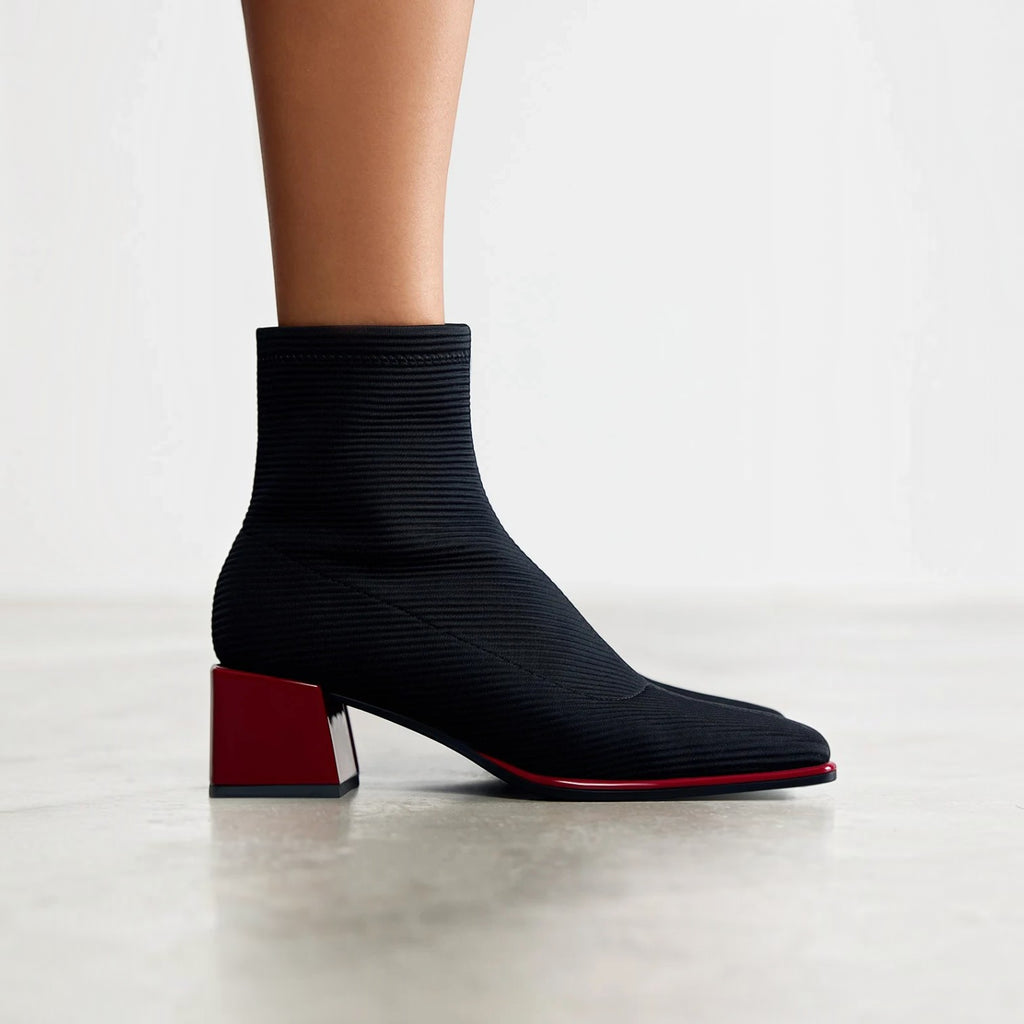 ShoeShop Gioseppo 80683 black ribbed knit ankle boots with a square toe and a contrasting red block heel