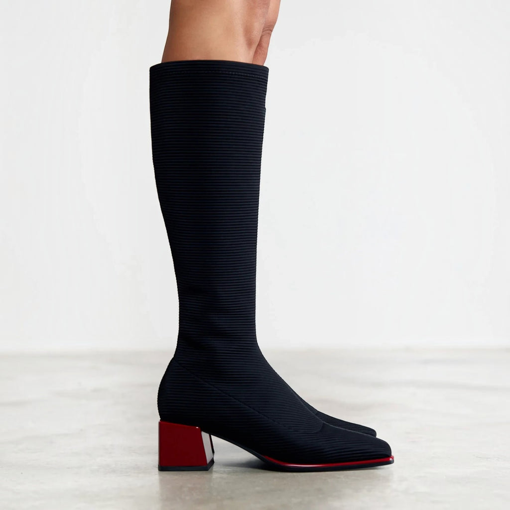 ShoeShop Gioseppo 80684 black ribbed knee-high boots with a square toe and a distinct red block heel