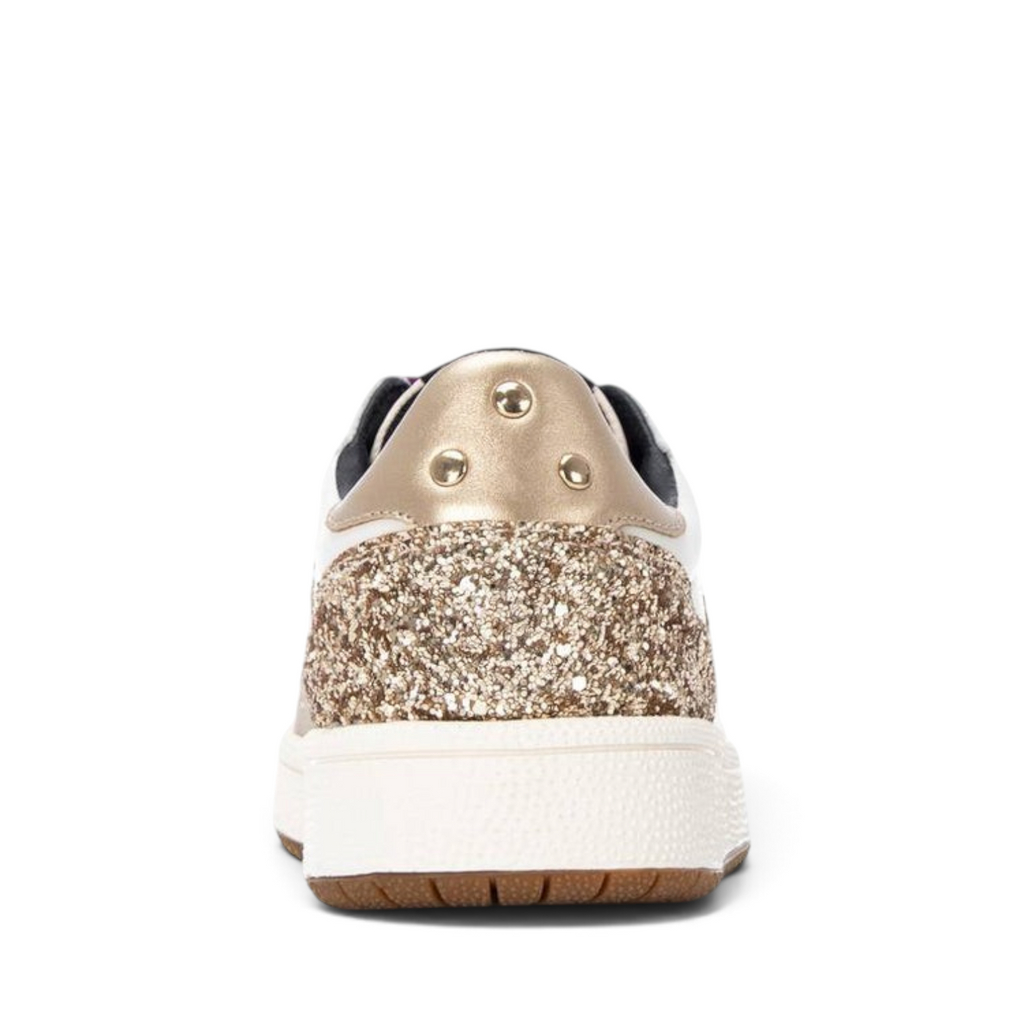 ShoeShop sneakers featuring a gold glitter heel counter, metallic stud accents, and a white textured rubber sole.