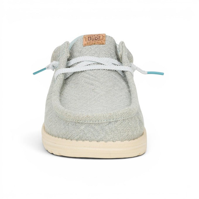 ShoeShop Hey Dude 430854TS light grey canvas slip-on shoe with white laces and a textured rubber sole