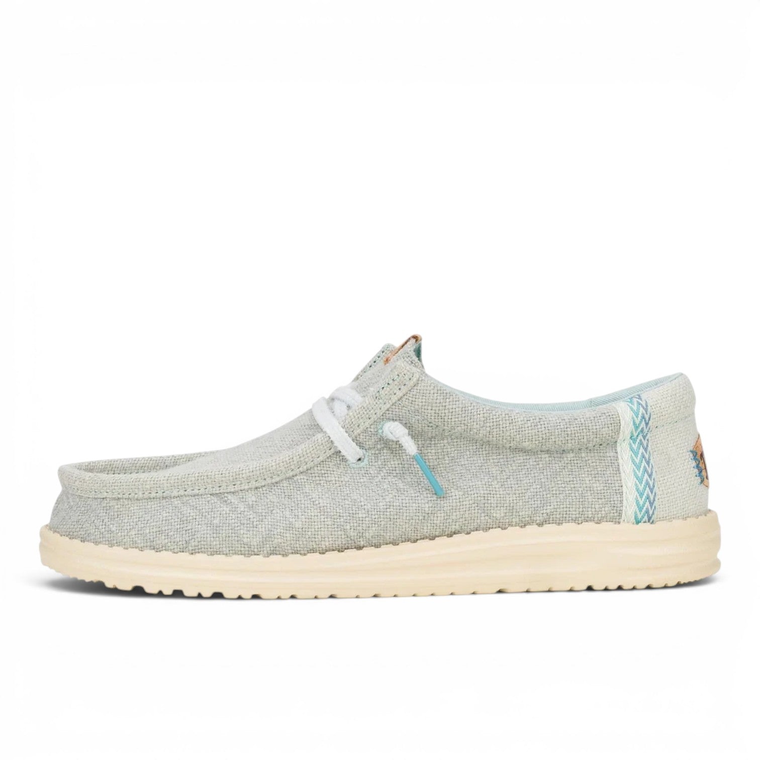 ShoeShop Hey Dude light grey canvas slip-on shoe with white laces and a textured cream rubber sole