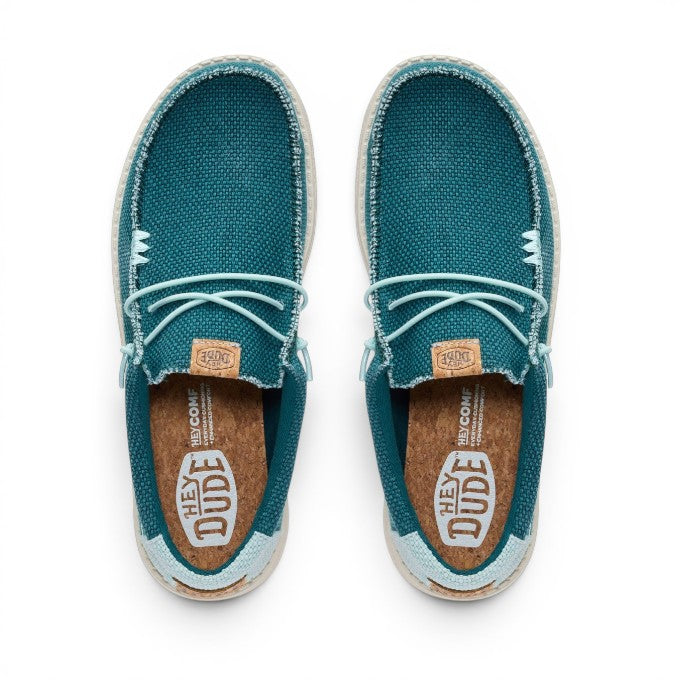 ShoeShop Hey Dude teal canvas slip-on shoes with cork insoles and elastic laces, top-down view