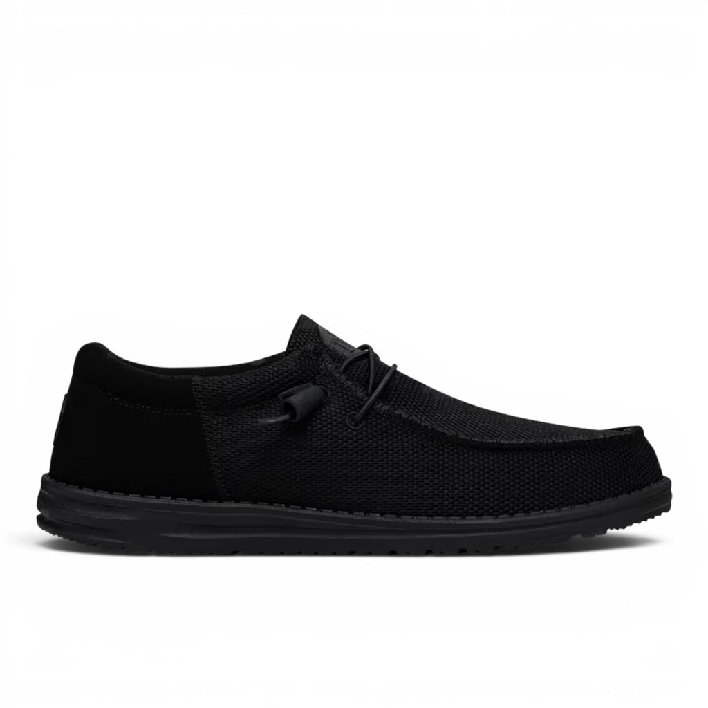 ShoeShop Hey Dude Wally Funk Mono black slip-on shoes with a breathable mesh upper and lightweight sole.