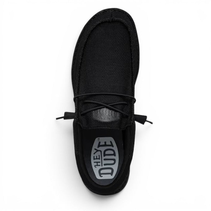 ShoeShop Hey Dude Wally Funk Mono slip-on shoe in all-black with breathable mesh upper and elastic lacing system