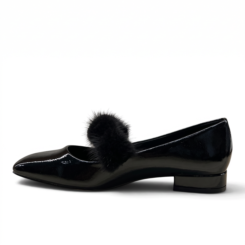 ShoeShop Kharisma 3042 black synthetic patent leather flat shoe with a decorative faux fur pom-pom detail