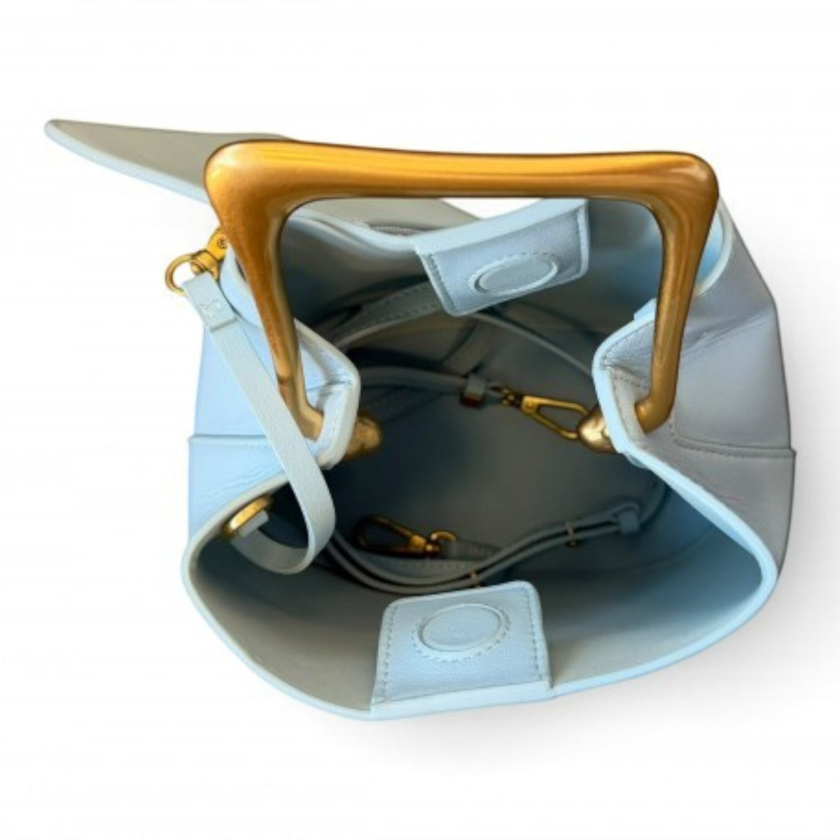 ShoeShop light blue leather bucket bag with a distinctive gold-toned structured top handle and detachable strap