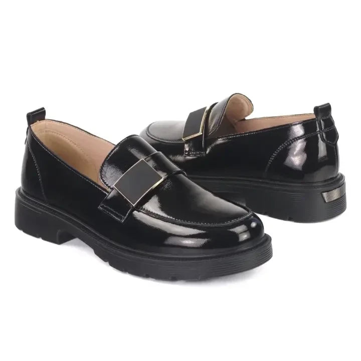 ShoeShop Loretta Vitale black patent leather loafers with a chunky rubber sole and decorative metal buckle detail