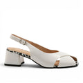 ShoeShop Loretta Vitale white leather slingback sandals with a block heel and leopard print trim detail
