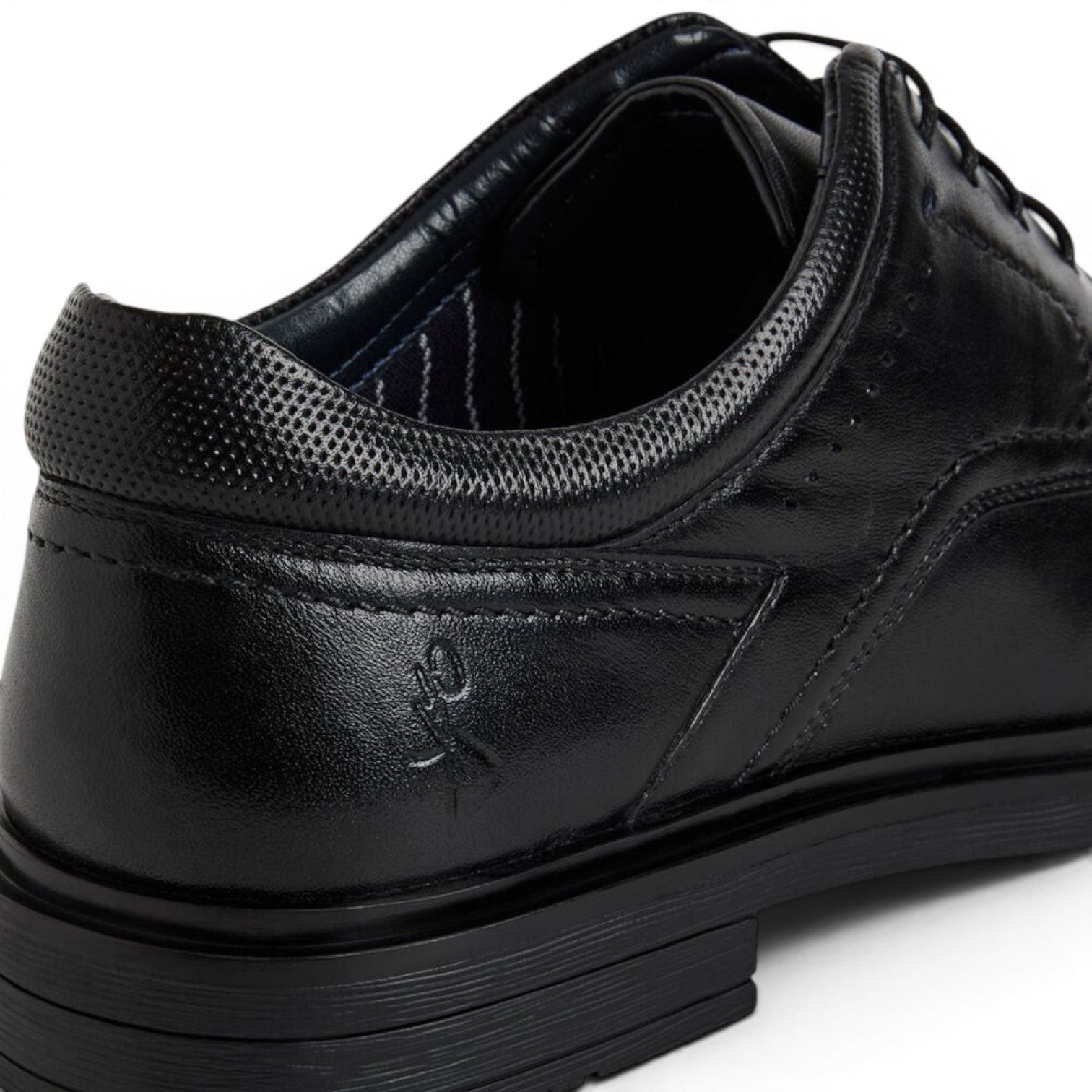 ShoeShop Marco Tozzi black leather lace-up shoe with textured heel detail and embossed logo