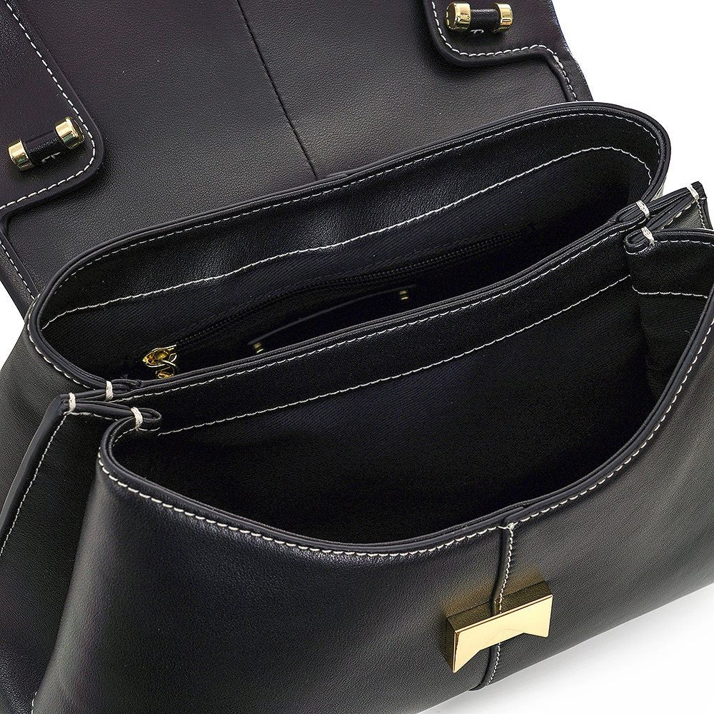 ShoeShop Moki black leather handbag with white contrast stitching and gold metal clasp closure