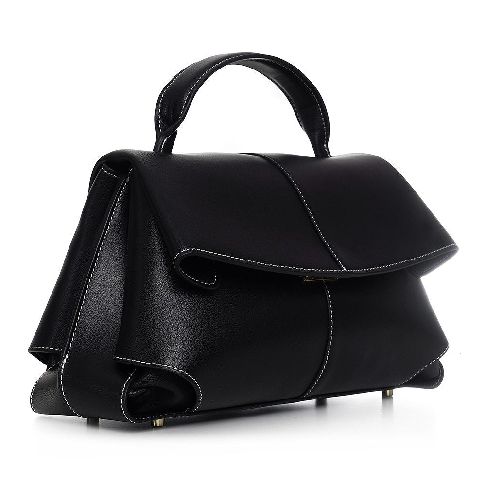 ShoeShop Moki black leather handbag with white contrast stitching and a structured top handle design.