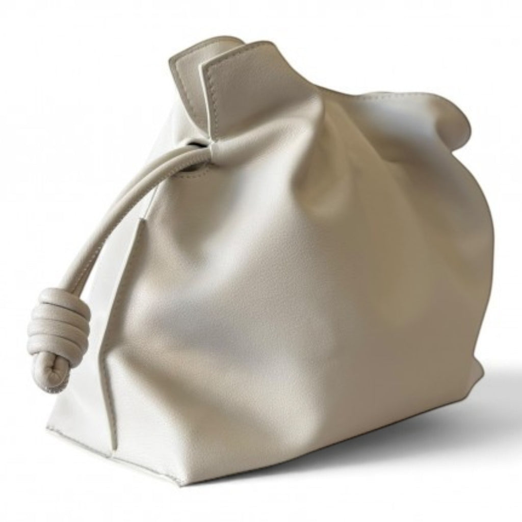 ShoeShop soft off-white leather pouch handbag with a drawstring closure and detachable shoulder strap