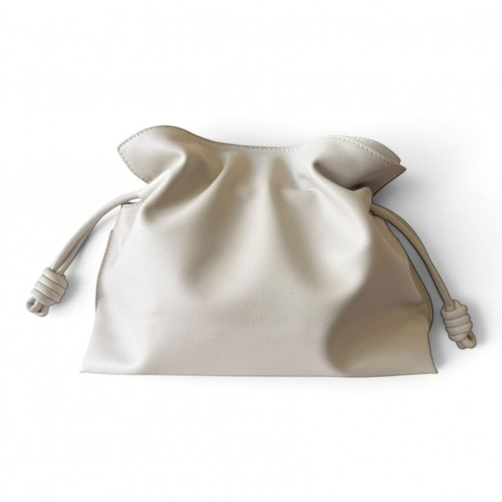 ShoeShop soft off-white leather pouch bag with a drawstring closure and detachable shoulder strap