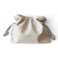 ShoeShop soft off-white leather pouch bag with a drawstring closure and detachable shoulder strap