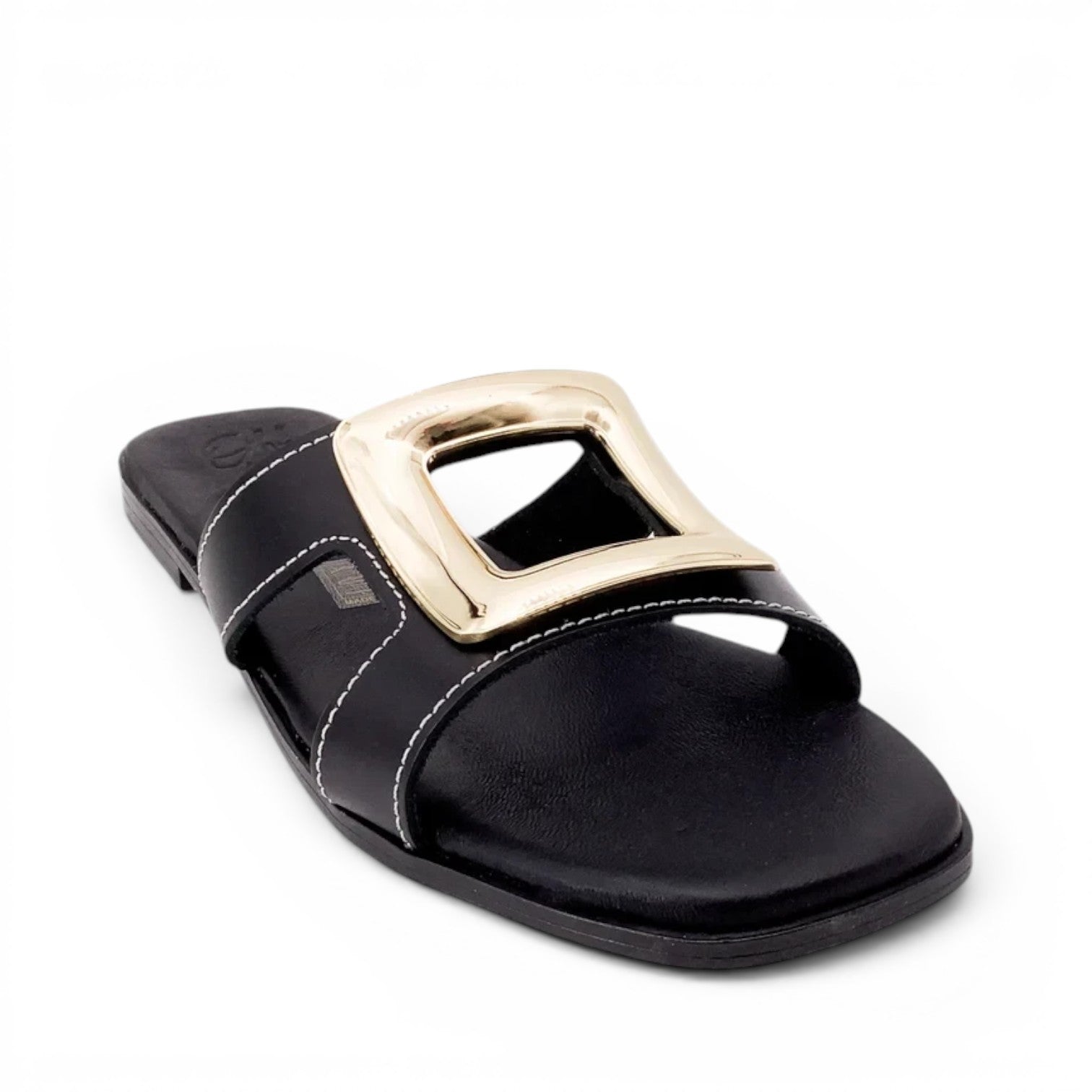 ShoeShop Oh My Sandals 5565 black flat slide sandals with a large gold square buckle and white contrast stitching.