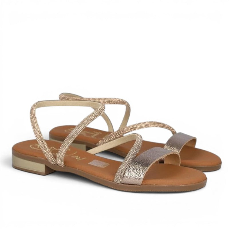 ShoeShop Oh My Sandals 5586 featuring rose gold metallic straps with delicate rhinestone embellishments and flat heel