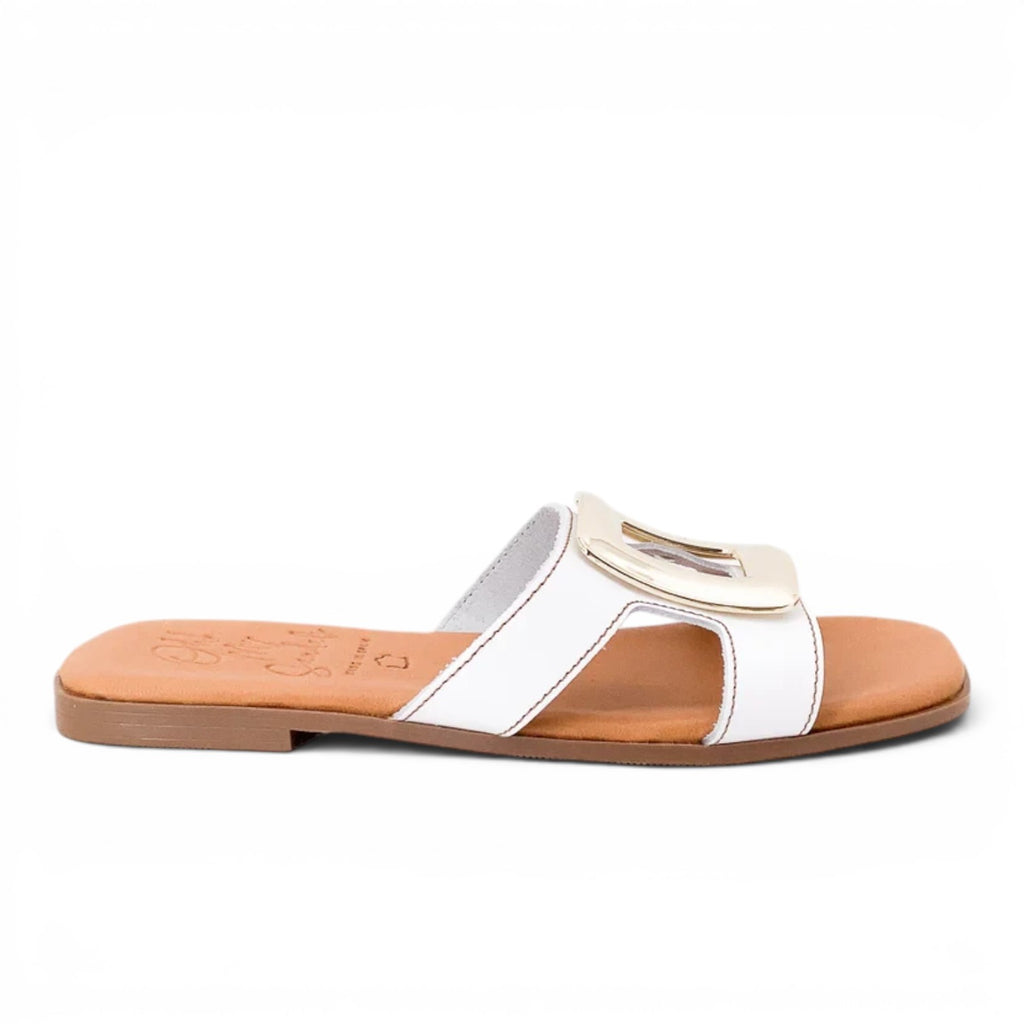 ShoeShop Oh My Sandals 5565 white leather flat slides with a large gold buckle detail and tan footbed