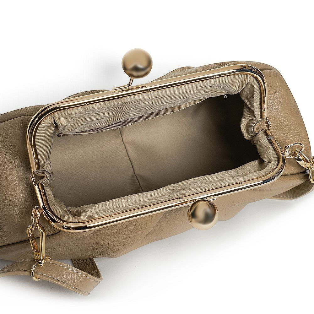 ShoeShop Pasticcino beige leather clutch bag with gold metal frame and clasp closure, showing interior textile lining.