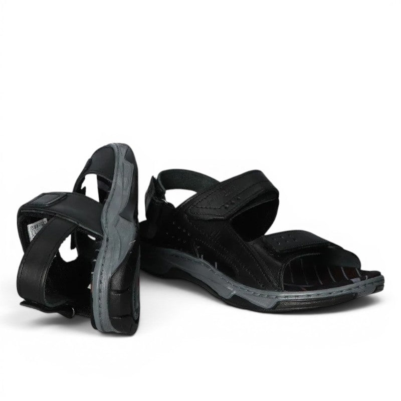 ShoeShop Pegada black leather sandals with adjustable velcro straps and a grey cushioned sole