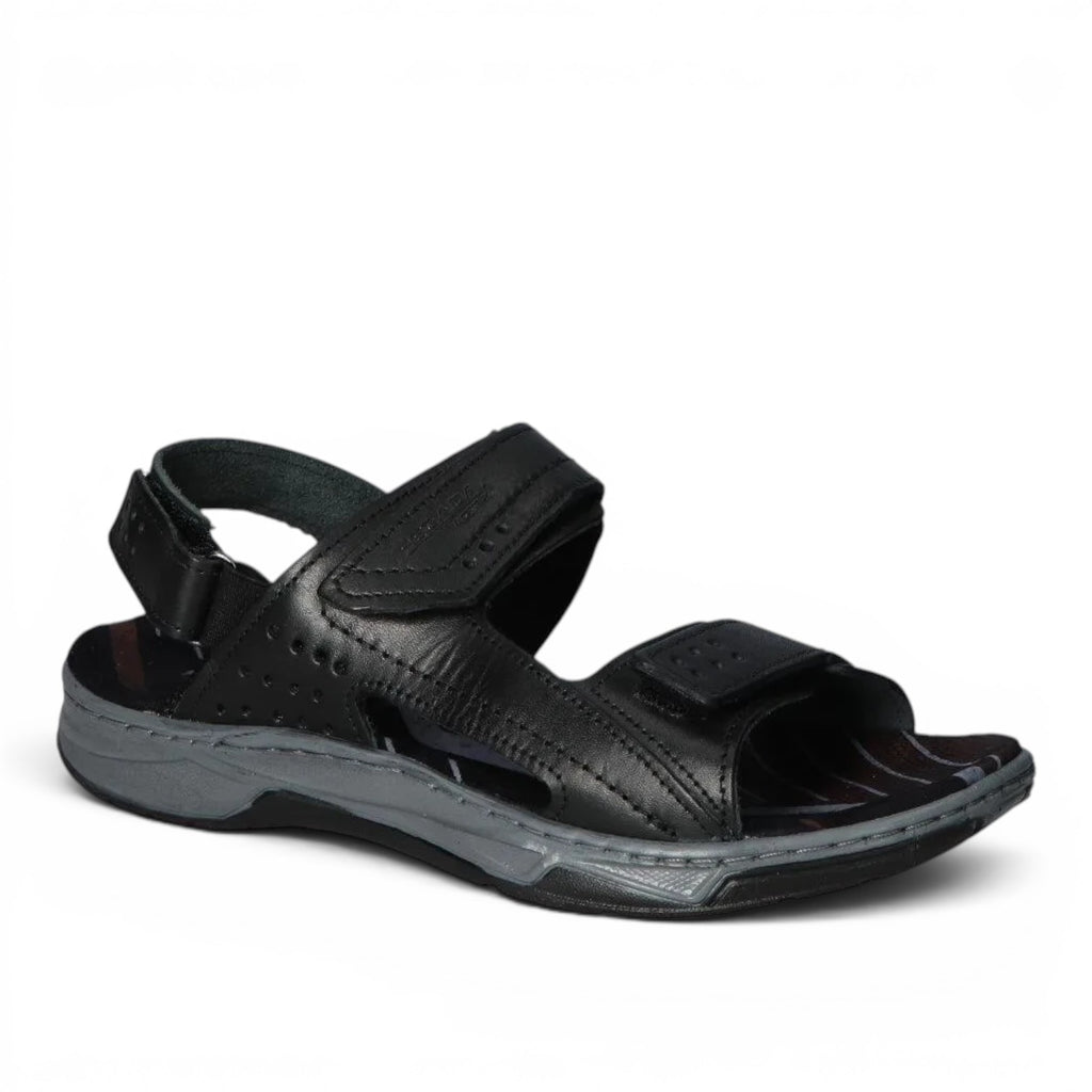 ShoeShop Pegada black leather sandals with adjustable velcro straps and a grey cushioned sole